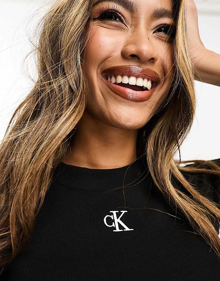 Calvin Klein Jeans Rib Baby Tee In Black For Women 2 Calvin Klein Jeans Rib Baby Tee In Black For Women - Image 2
